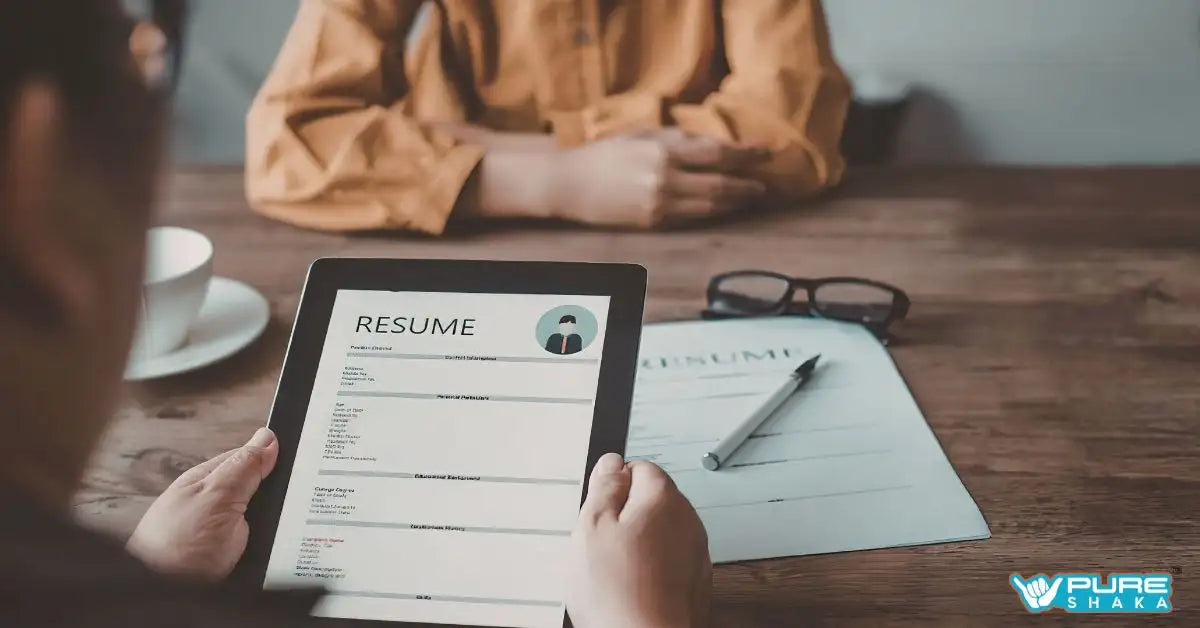 Black tablet displaying a resume with white text and a circular profile icon.